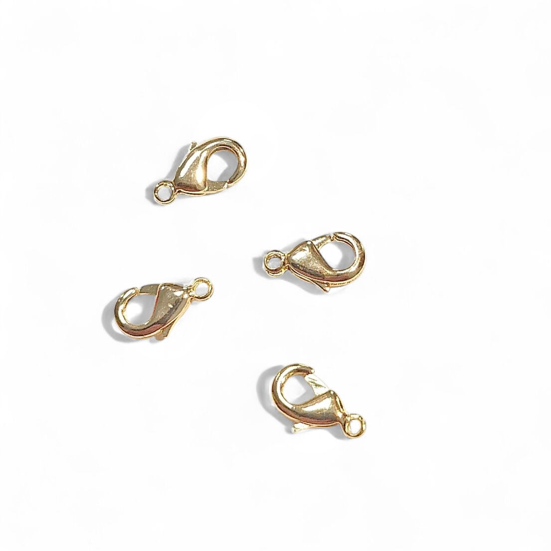 Smykkelåse. 9x6 mm. Forgyldte med 18 karat guld.