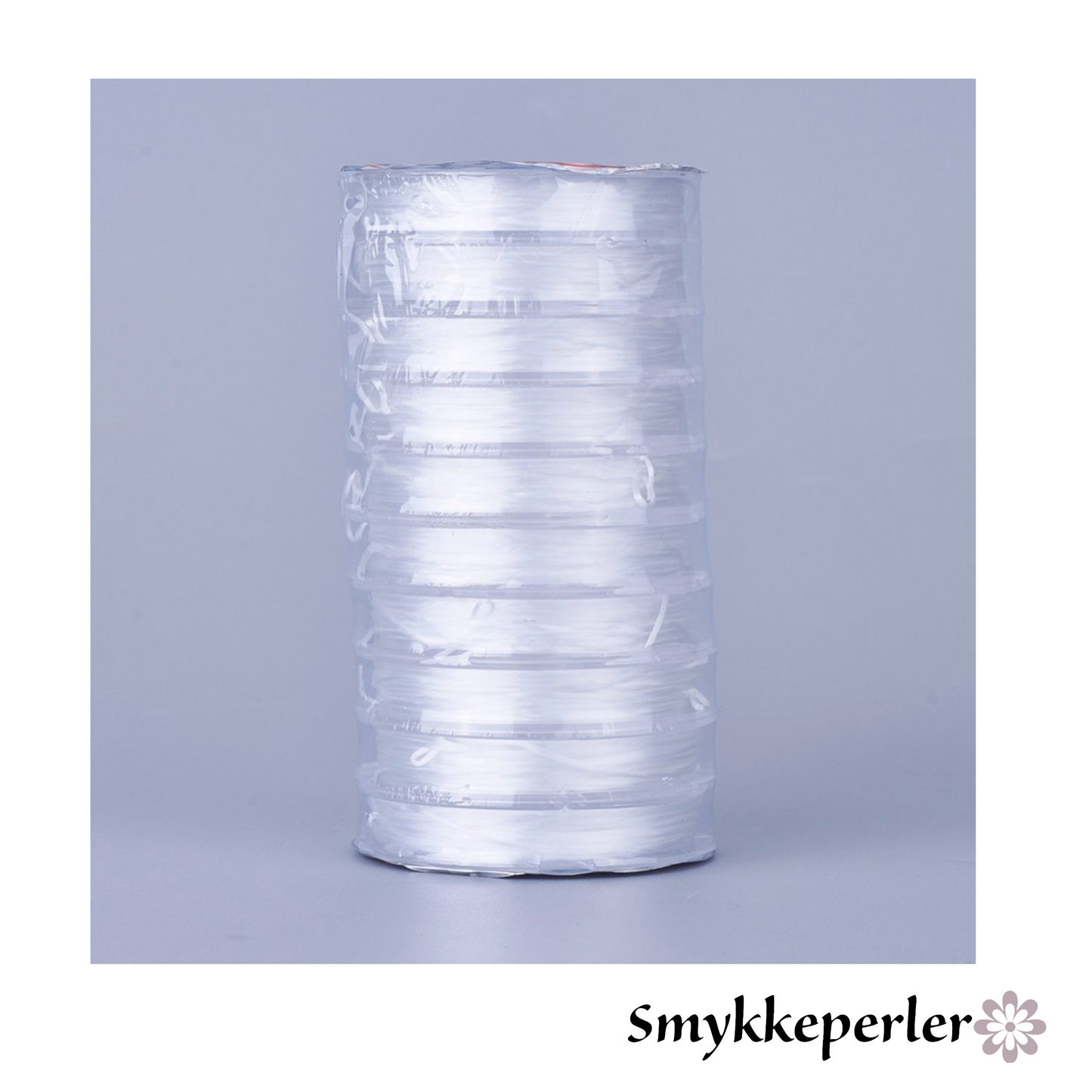 Smykkeelastik klar 0,8 mm. 10 ruller x 10 m. flad.