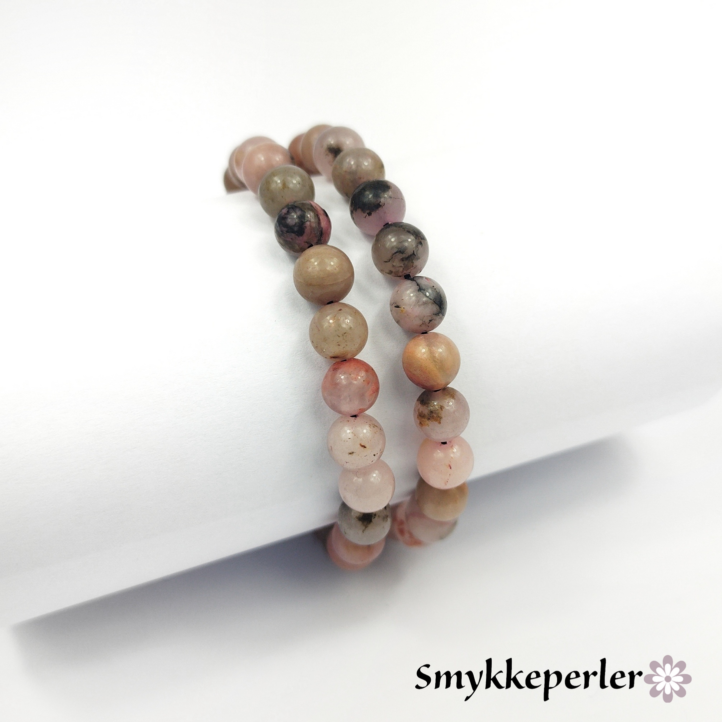 Rhodonite perler 6 mm. Hel streng.