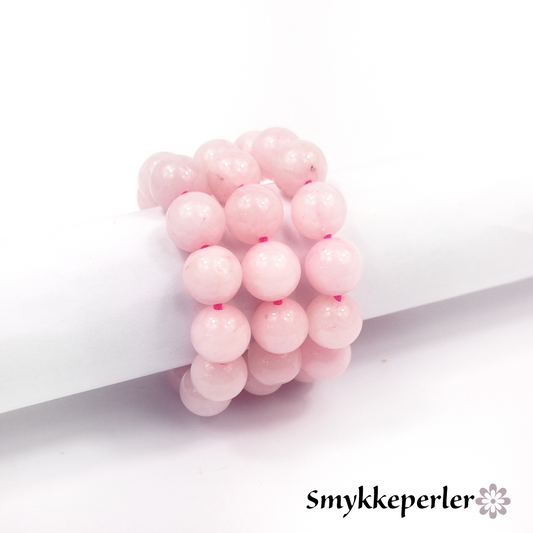 Rosa quartz. Perler 8 mm. Hel streng.