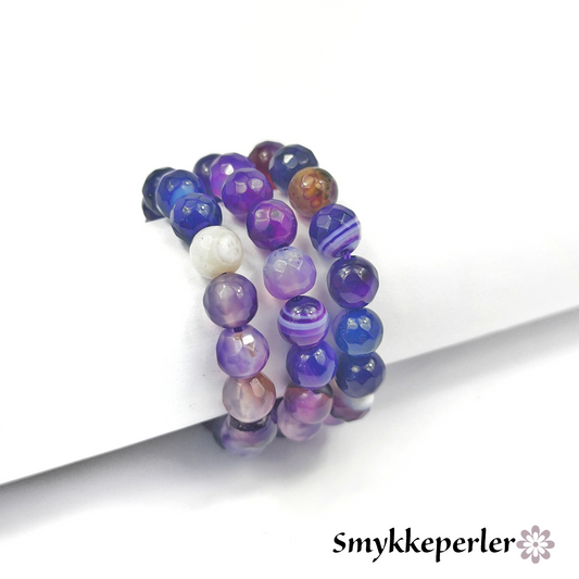 Agat lilla facetter 6 mm. hel streng.