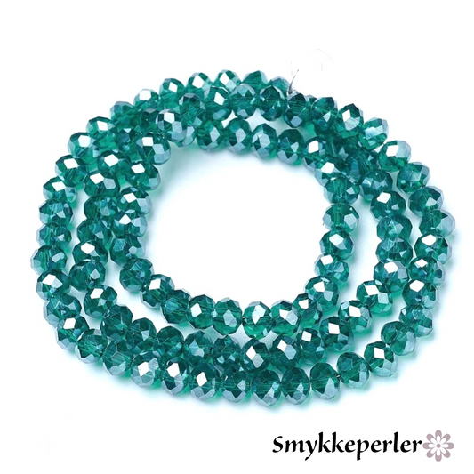 Glasfacet runde cyan 6 mm. Hel streng.