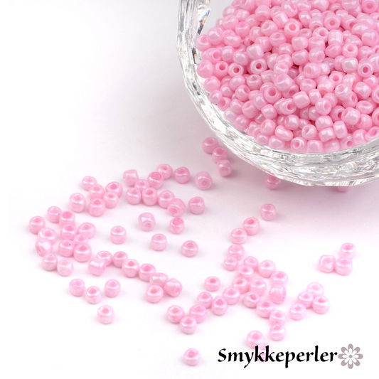 Seed beads rosa opaque. Ca. 3 mm.