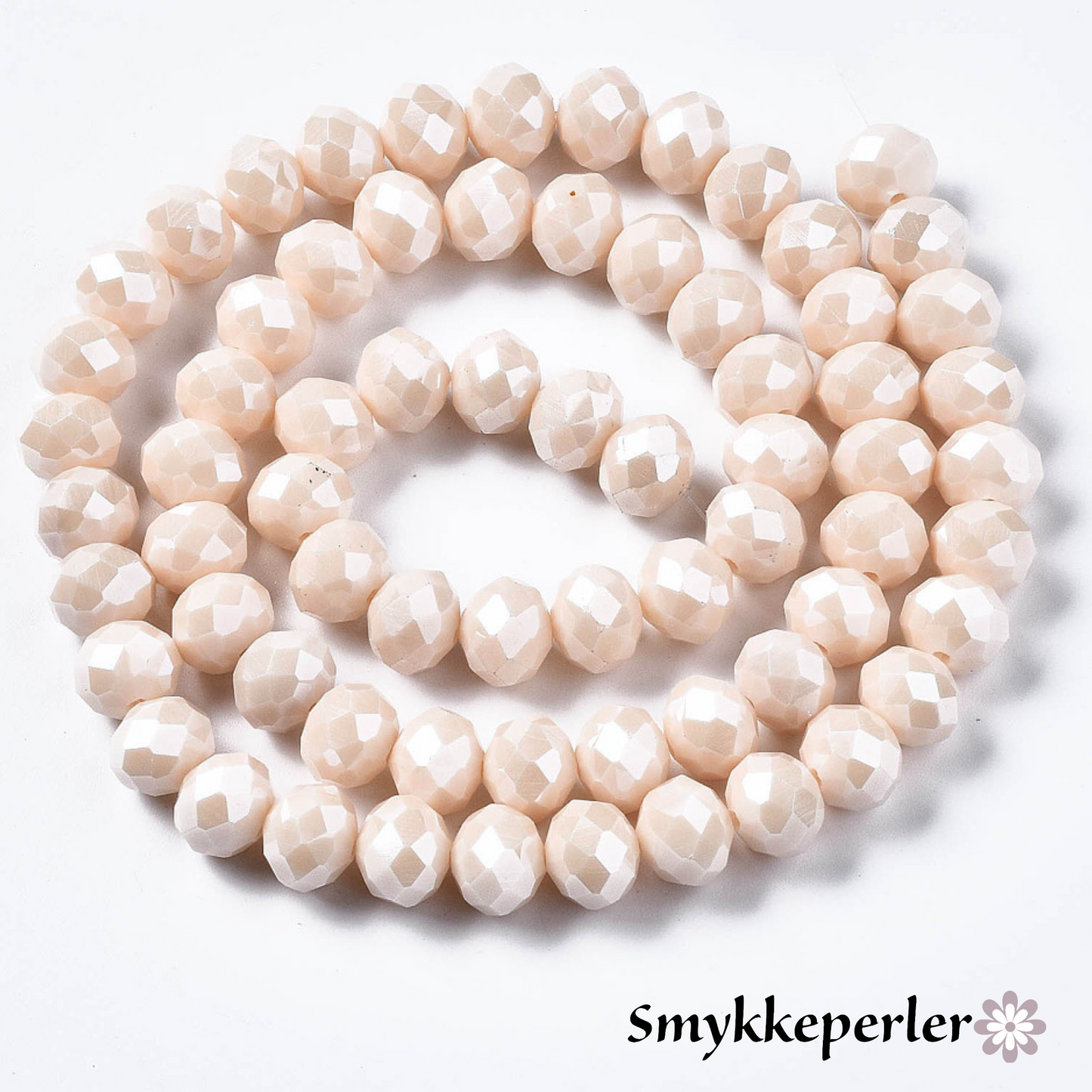 Glasfacetter rondeller beige 3x2 mm. Hel streng.