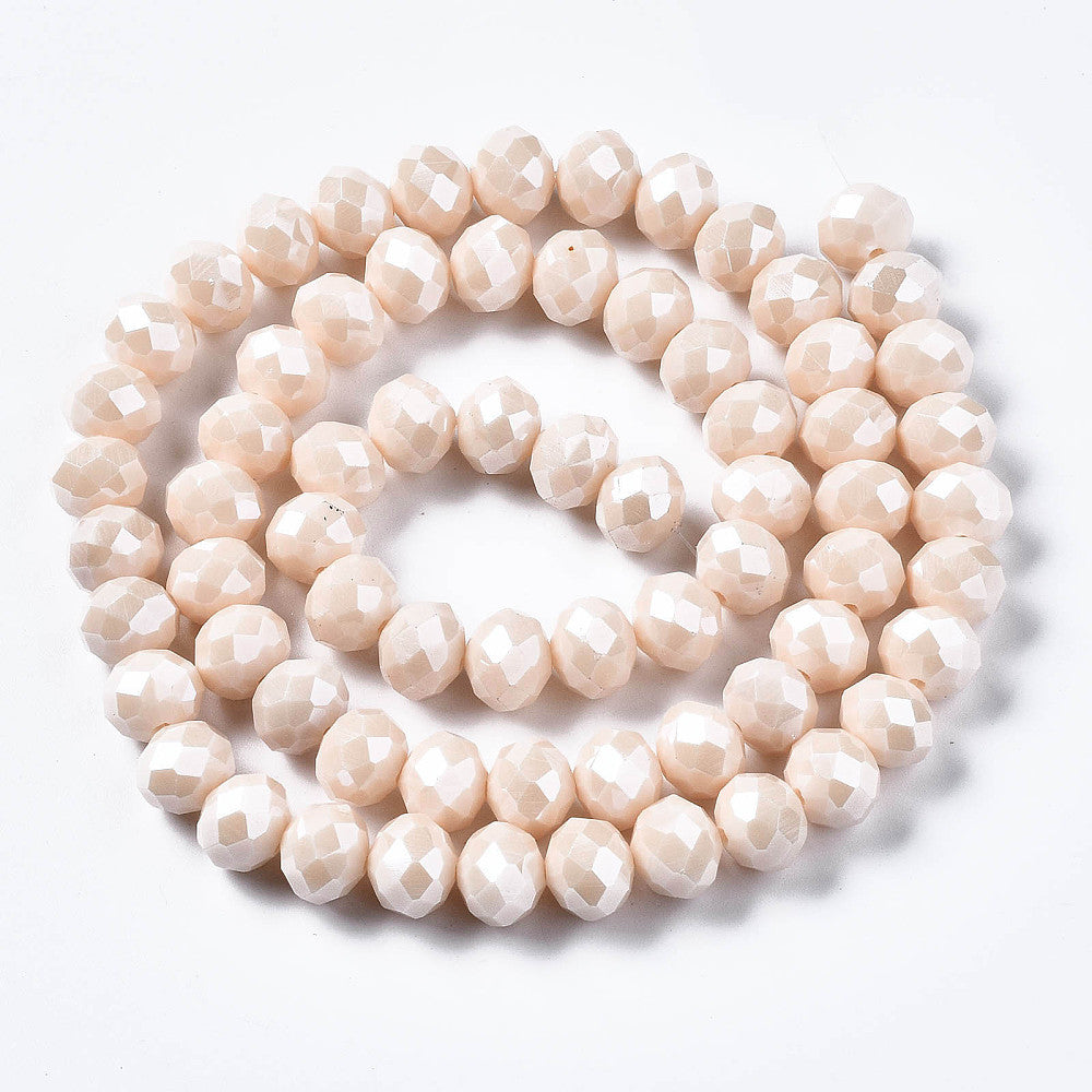 Glasfacetter 3x4 mm. Hel streng. Beige.