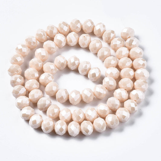 Glasfacetter rondeller beige 3x2 mm. Hel streng.