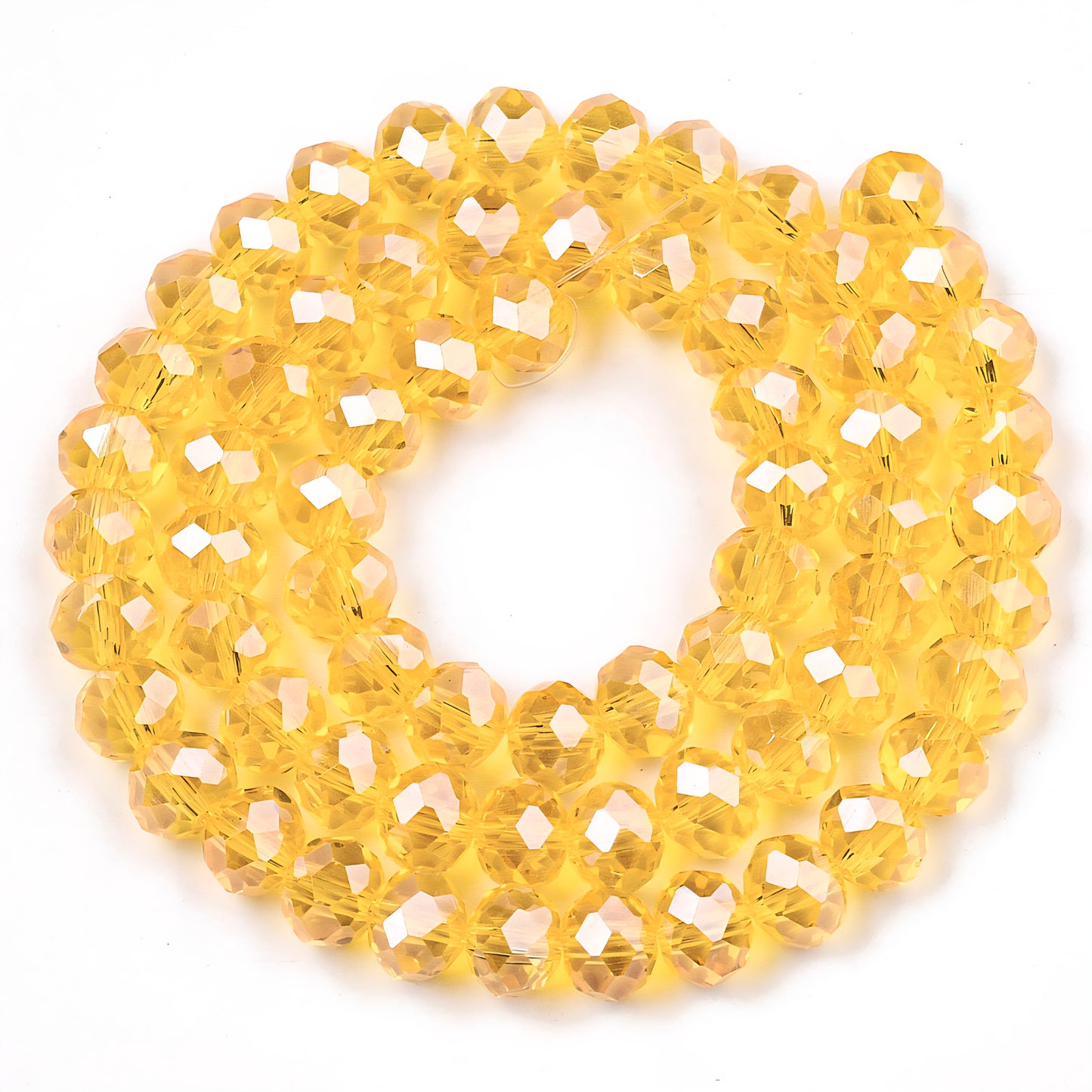 Glasfacetter rondeller 3x2 mm. Solgul. Hel streng.