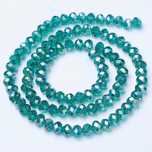 Glasfacet klare cyan rondeller 3x2mm. hel streng.