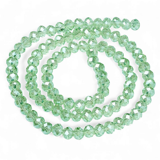 Glasfacet klare lys mint rondeller 3x2mm. hel streng.