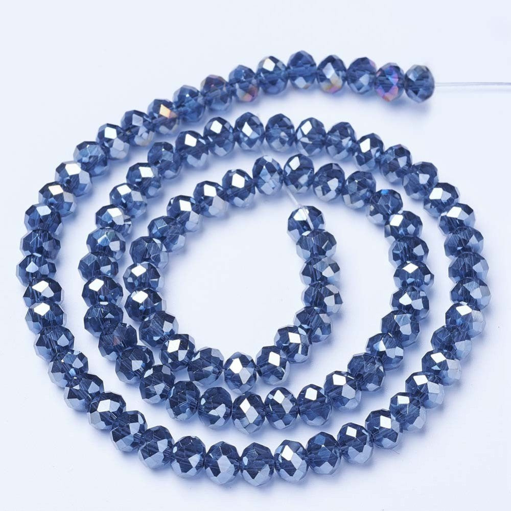 Glasfacetter marineblå 6x5 mm. Hel streng.