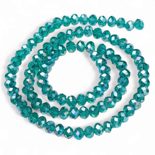 Glasfacetter rondeller klar cyan 4x3. hel streng.