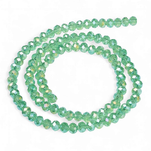 Glasfacetter rondeller klar lysgrøn 4x3. hel streng.