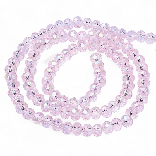 Glasfacetter klare rosa rondeller 3x2mm. hel streng.