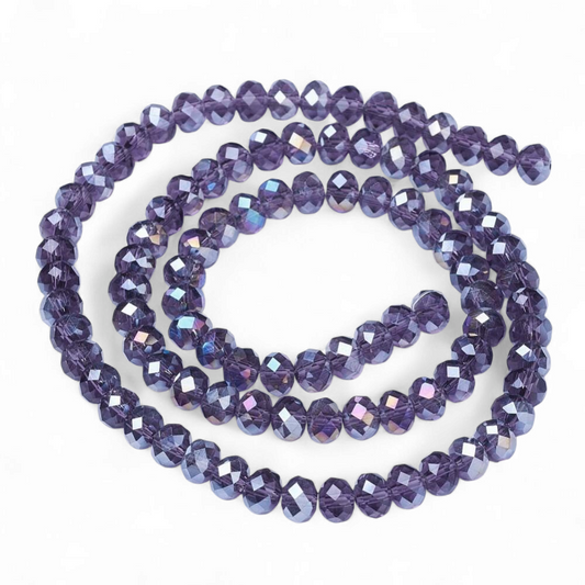 Glasfacetter indigoblå 4x3 mm. Hel streng.