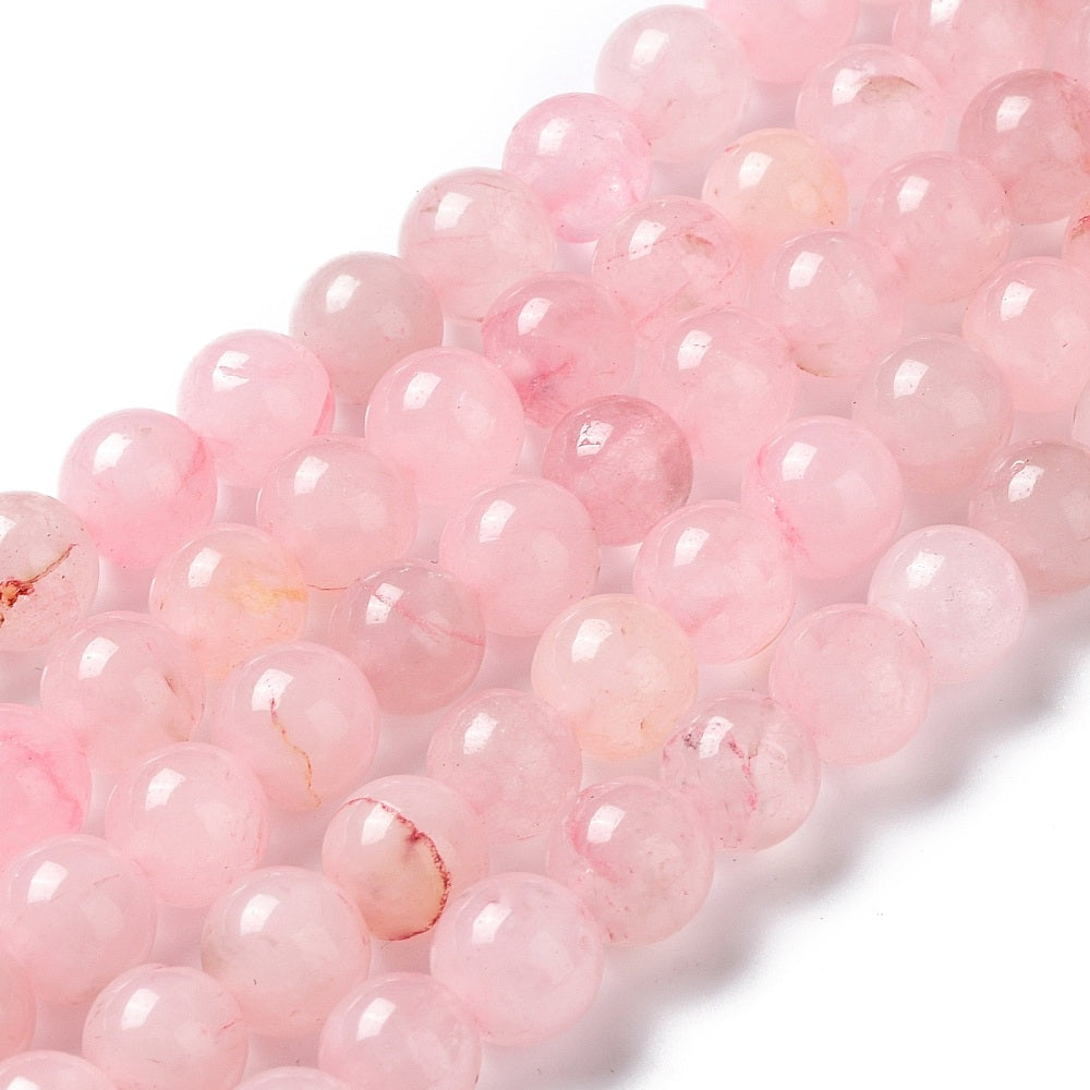 Rosa quartz. 10 mm. Hel streng.
