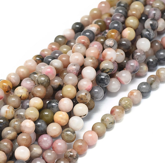 Rhodonite perler 8 mm. Hel streng.