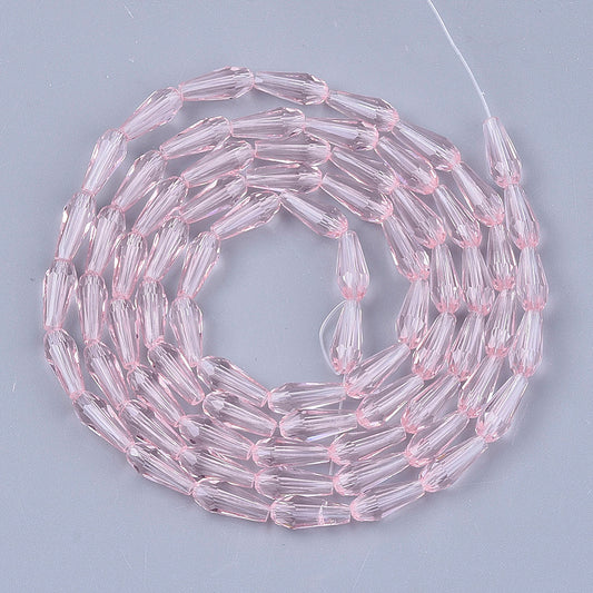 Glasfacetter dråbeformede, rosa. 10x4mm. Hel streng 38 cm.