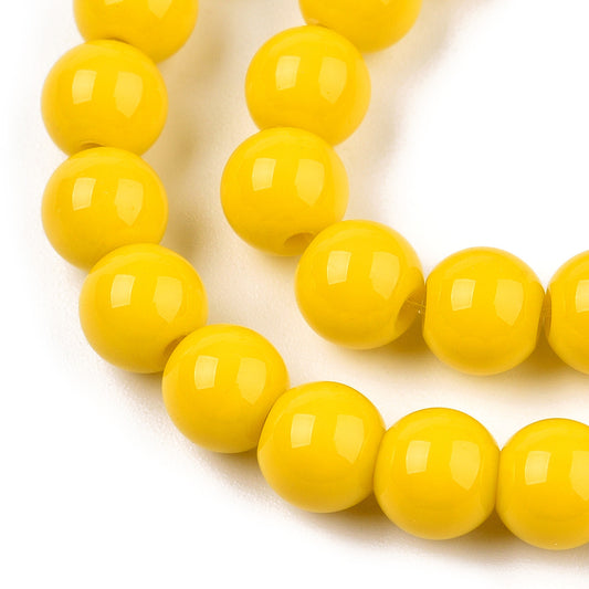 Runde glasperler 6 mm. Sol gul jade look. Hel streng.