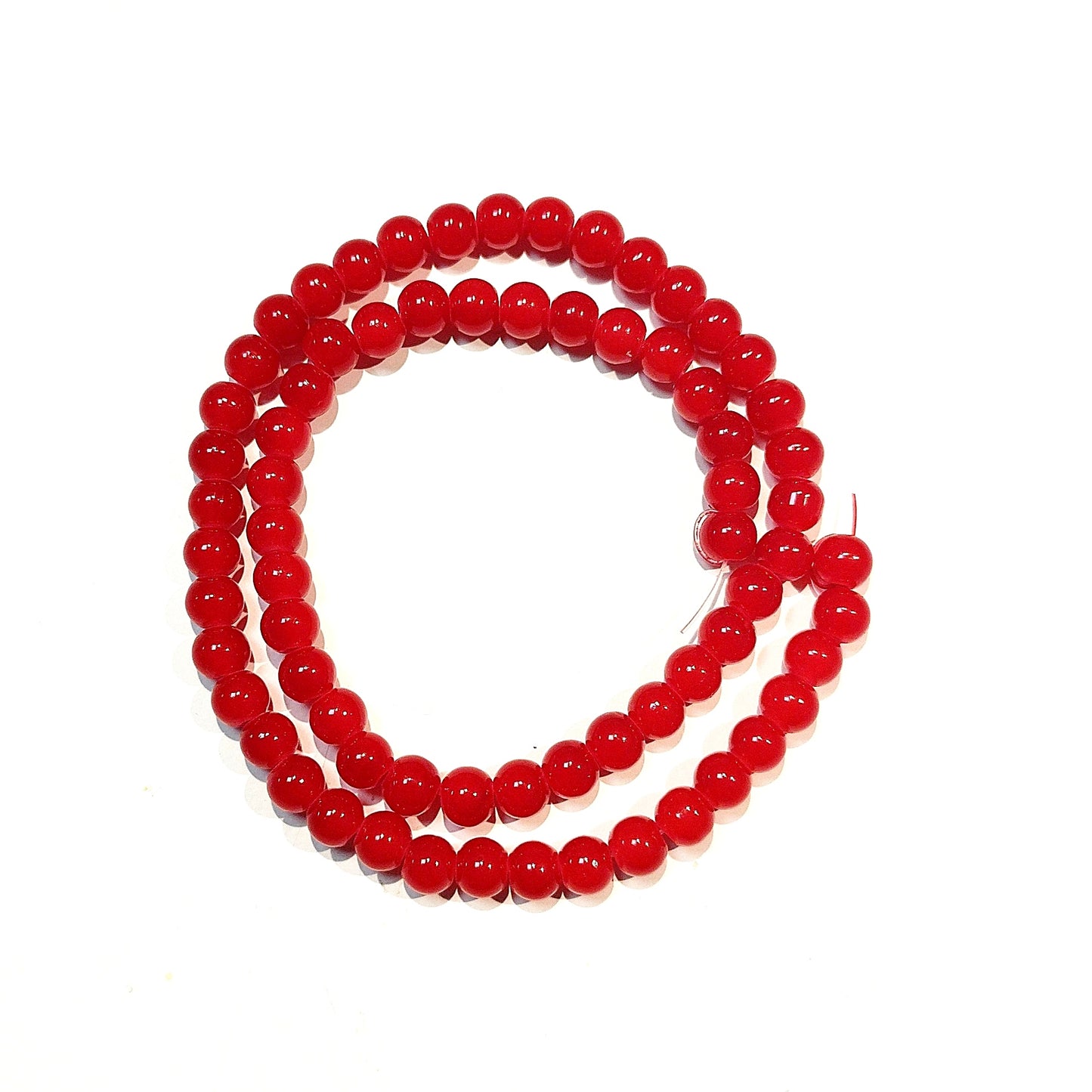 Runde glasperler, jade-look røde, 6 mm. Hel streng.