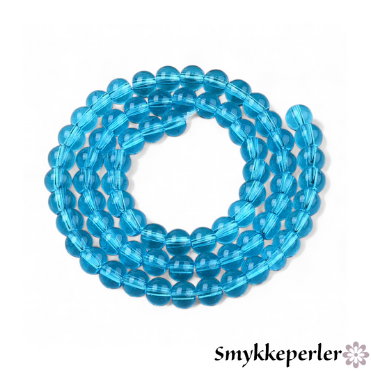 Runde glasperler aqua 6 mm. Hel streng.