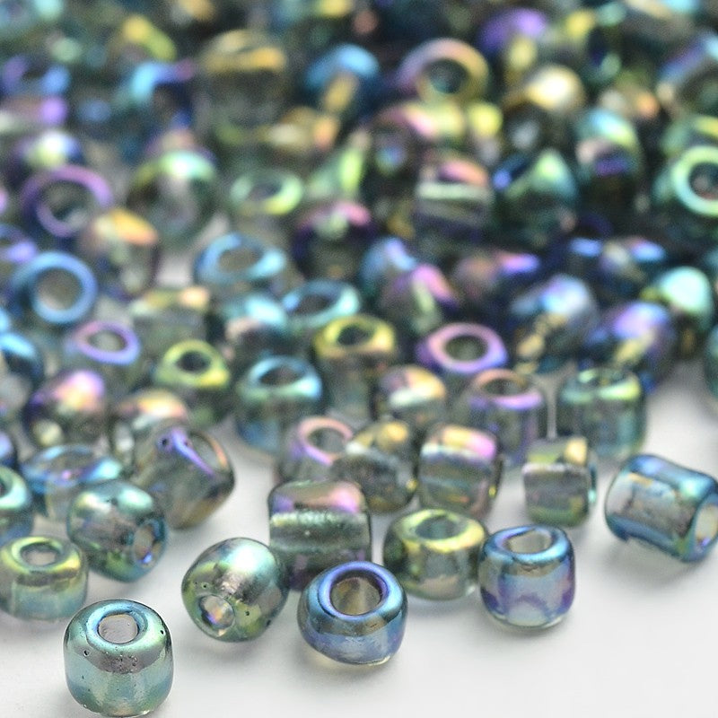 Seed beads mørkegrå transparent. Ca. 3 mm.