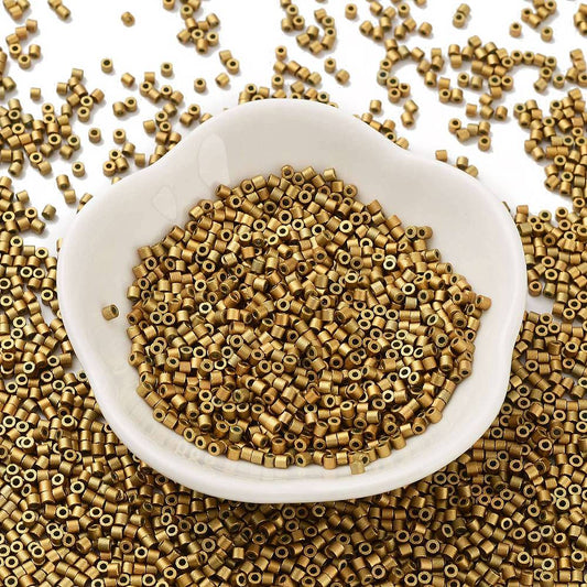 Cylinderperler delica style 2x1,5mm. 10g. Guldbrun.