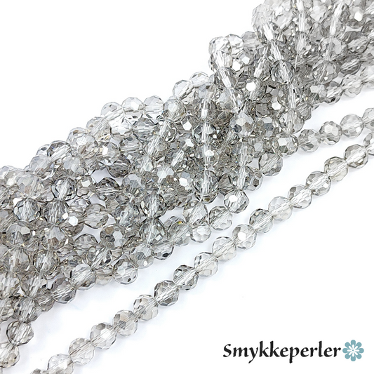 Glasfacetter gainsboro runde 4 mm. Hel streng.