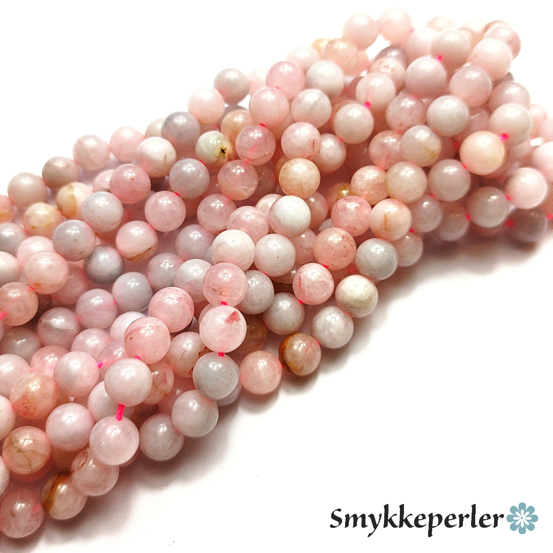 Rosa quartz. Perler 8 mm. Hel streng.