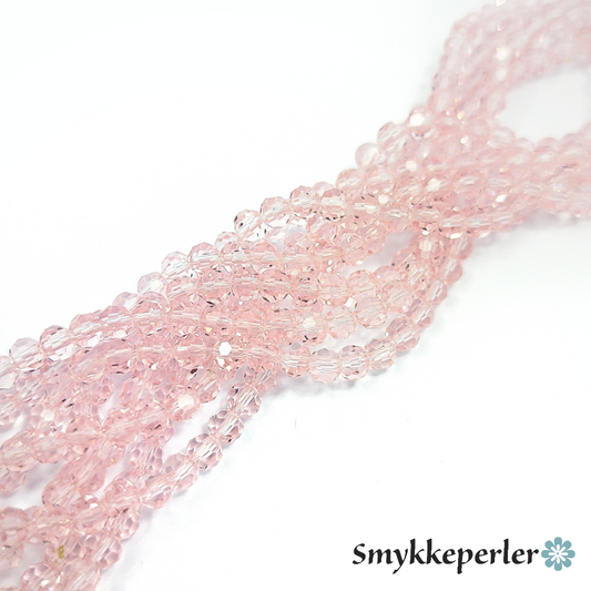 Glasfacetter rosa rondeller 4x3 mm. Hel streng.