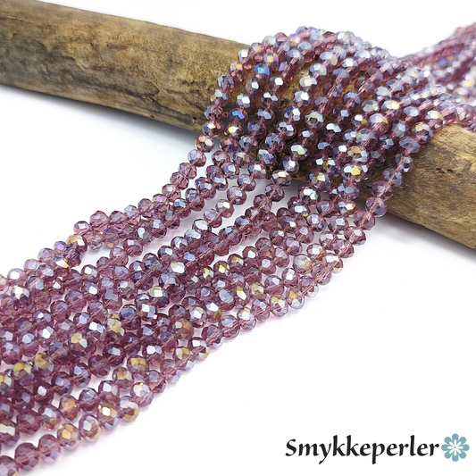 Glasfacetter gammelrosa rondeller. 6x5 mm. Hel streng.