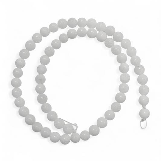 Jadefacetter runde. Hvid 6 mm. Hel streng.