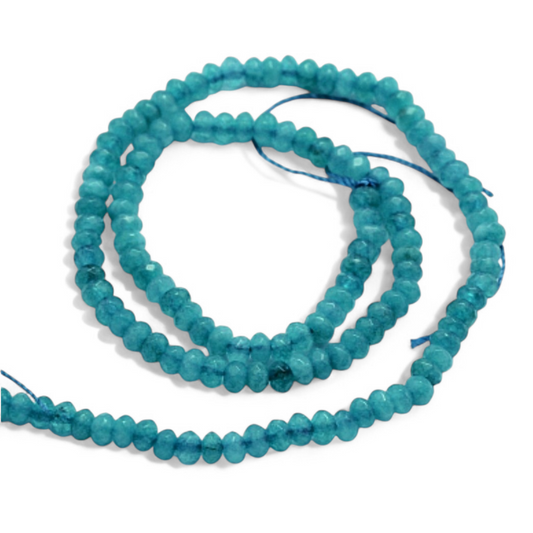 Jadefacetter rondeller. Cyan 4x3 mm. Hel streng.