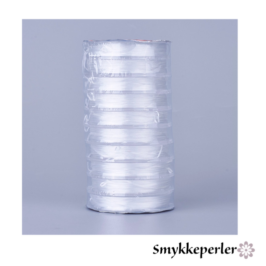 Smykkeelastik klar 0,8 mm. 10 ruller x 10 m. flad.