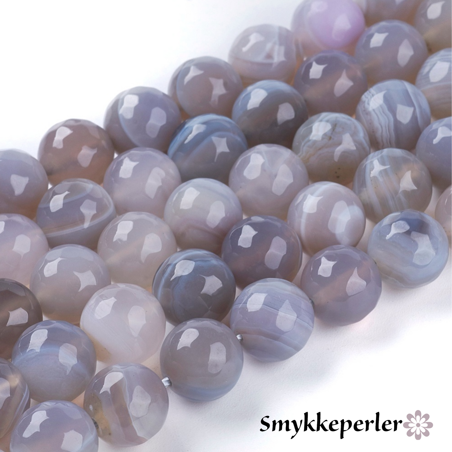 Natural stribe agat. Facetter. 10 mm. Hel streng.