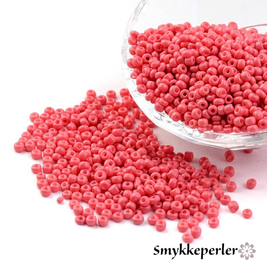 Seed beads coralrød opaque. Ca. 3 mm.