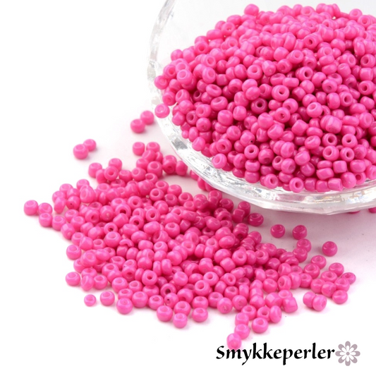 Seed beads fuchsia opaque. Ca. 3 mm.