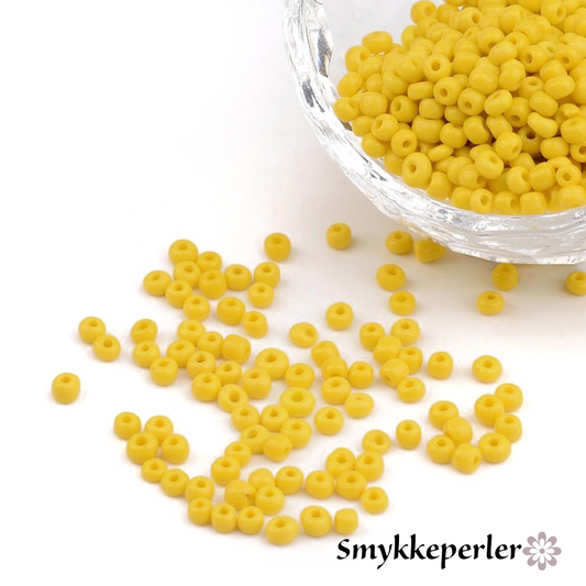 Seed beads gul opaque. Ca. 3 mm.
