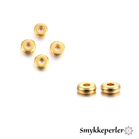Små flade mellemperler. 18k guld. 5 stk.