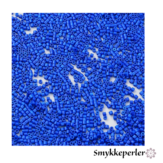 Cylinderperler delica style 2x1,5mm. 10g. Blå.