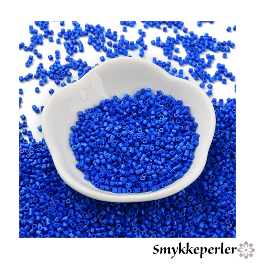 Cylinderperler delica style 2x1,5mm. 10g. Blå.