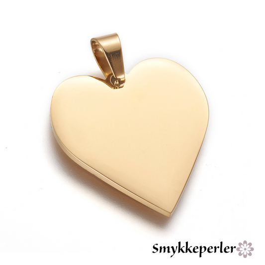 Hjertevedhæng i stål forgyldt med 18k guld.  25x23x1,5mm. Vandfast og svedfast.