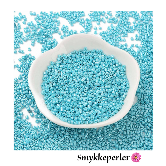 Cylinderperler delica style 2x1,5mm. 10g. Mørk turkis