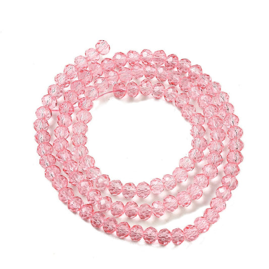 Glasfacetter klar pink rondeller 4x3 mm. Hel streng.