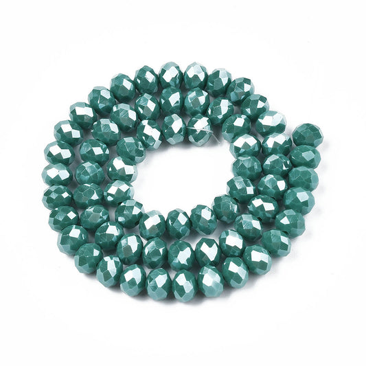 Glasfacet cyan rondeller 3x2mm. hel streng.
