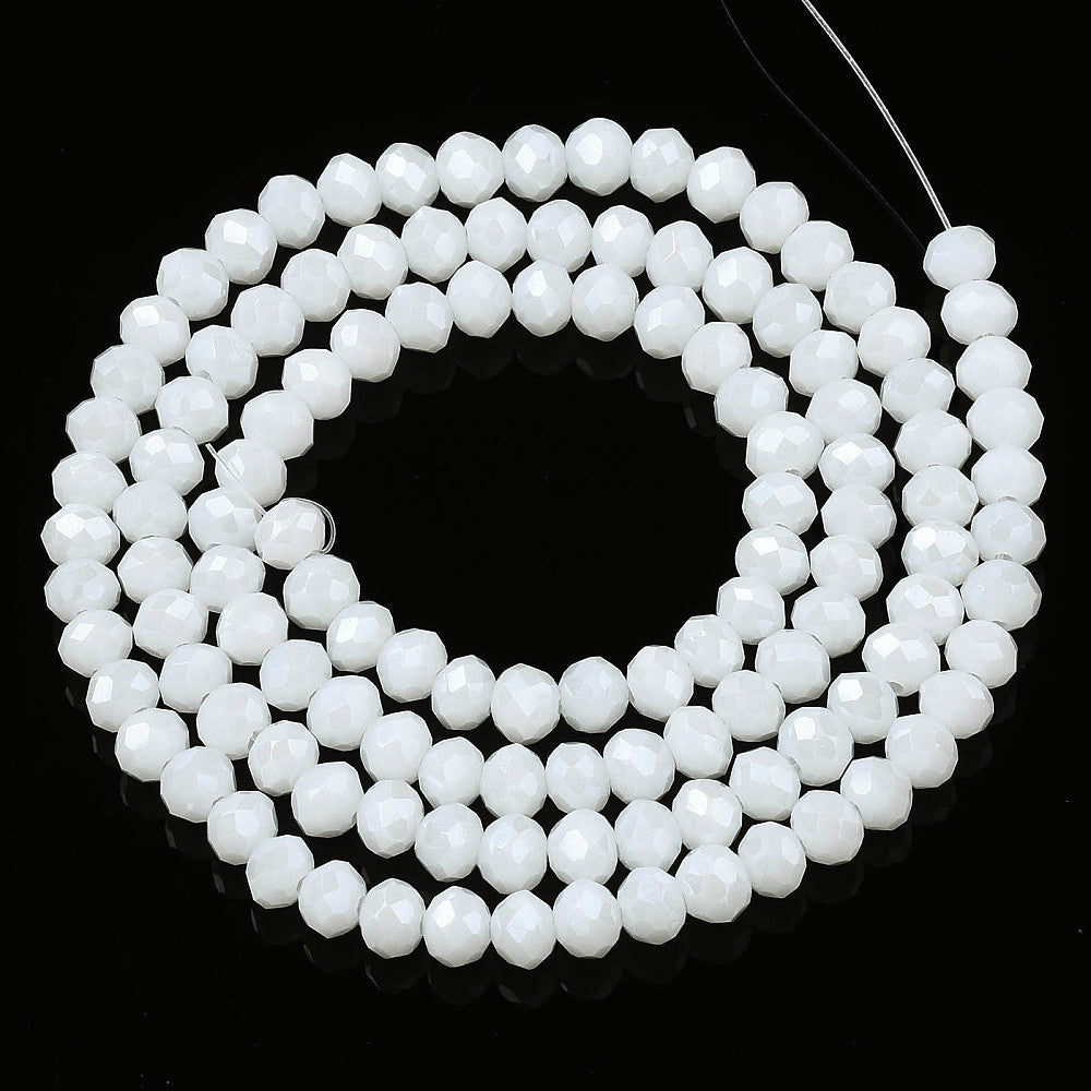 Glasfacetter rondeller hvide 3x2 mm. Hel streng.