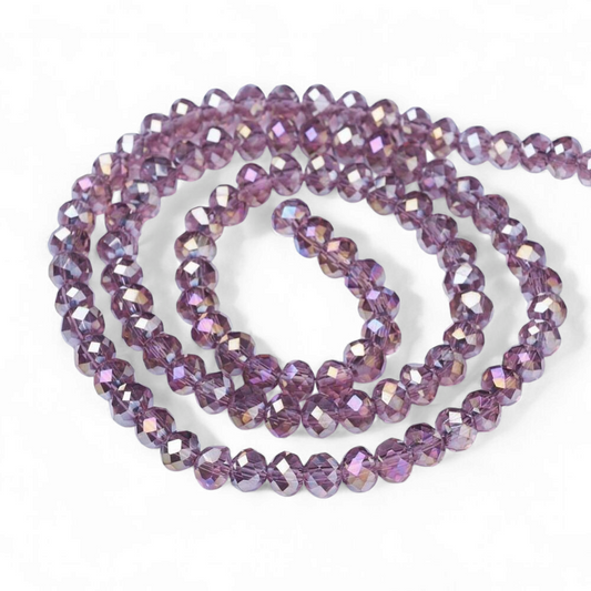 Glasfacet klare gammelrosa rondeller 3x2mm. hel streng.