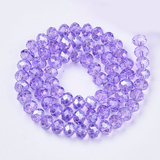 Glasfacet klare lilla rondeller 3x2mm. hel streng.