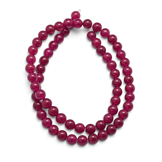 Jade rød violet. Runde 6 mm. Hel streng på ca.  38 cm.