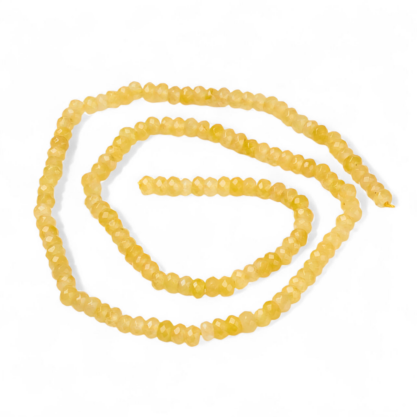 Jadefacetter rondeller. Gule 4x3 mm. Hel streng.