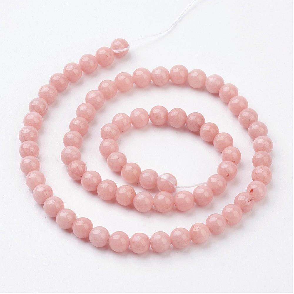 Jadeperler fersken-blush. Runde 6 mm. Hel streng på ca. 38 cm.